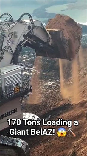 This massive 170-ton excavator is loading a giant BelAZ with a single bucket! 🚜⛏️