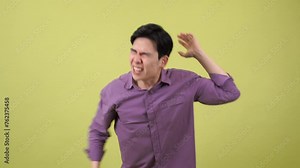 The Asian man was extremely angry, scolding and crumpling the paper and throwing it at the camera