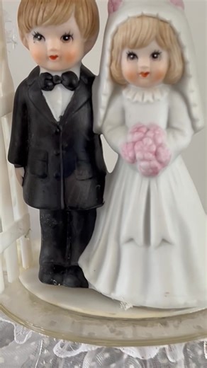 CA$28 • VTG Wedding Cake Topper Bride Groom Gazebo Lace Flowers Taiwan Marriage Love Weddings This is a vintage wedding cake topper featuring a couple, a bisque, bride and groom standing under a plastic archway/gazebo embellished with lace and flowers. Is a very cute collectable or addition to a wedding cake Made in Taiwan in the 1980s/90s 7 1/2 inches high, 5 1/4 inches wide In excellent condition Can be shipped for additional shipping cost https://www.facebook.com/marketplace/item/678877631934