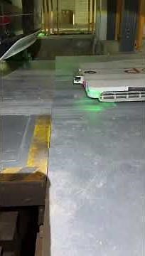 車両搬送ロボット × 立体駐車場｜エレベーター着床時の隙間を解消する可動フラットカー方式