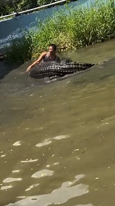 1.1M views · 2.9K reactions | The young man who drowned with a giant crocodile left those who saw him in amazement. The big crocodile tries to attack the man who entered the river where the crocodile is, but the man stops him by holding the crocodile's head and mouth tightly. #croc #wildanimals #wildnature #naturegeography #nature #wildlife #animals #alligator #crocodiles #river #humans #amazingpeople #crazyboy #giantanimals | Rasim Baylan | Facebook