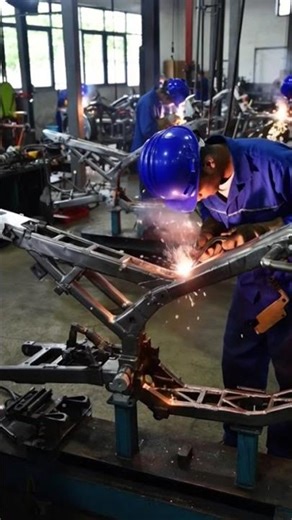 Video of a motorbike assembly line in an industrial factory setting #automatedassembly