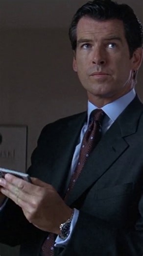 Remote-controlled, gadget-laden, and it comes in Aspen Silver: the BMW 750iL, driven by Bond (Pierce Brosnan) in TOMORROW NEVER DIES. | James Bond 007