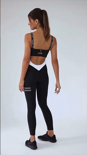 i082 • 4K Attractive SwimOutlet model wearing a Jumpsuit