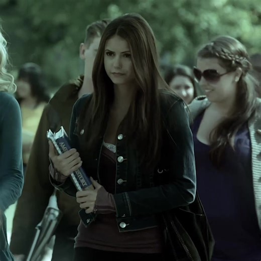 Nina Dobrev as Elena Gilbert Edit