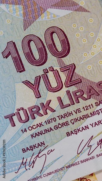 100 Turkish lira TRY banknote displayed. Currency note. Represents value in Turkish monetary system. Essential for transactions in Turkey