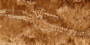 Exploring Valles Marineris on Mars with Helicopters, Not Rovers