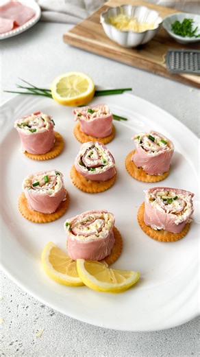 Kristel Talie on Instagram: "Ham and Cheese Roll Ups✨ If you’re on a hunt for a crowd-pleasing appetizer, you have to make these ham and cheese roll ups! They’re delicious, filled with cheese and will be gone in minutes🤤 What you’ll need Ham slices Cream cheese Gouda cheese Fresh chives Black pepper Crackers 1- Take one ham slice (if needed, tap with a kitchen towel to remove extra moisture) and evenly spread 1 heaping tablespoon of cream cheese. 2- Spread a layer of freshly grated Gouda