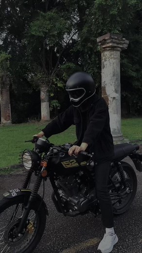 Classic Cafe Racer Ride Through Historical Scenery