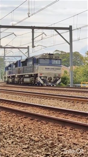 Manildra Freight Multimodal Train led by MAN012, MAN002 & MAN014 heading North on the Illawarra
