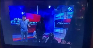 Maskerade män stormade tv-sändning i Ecuador