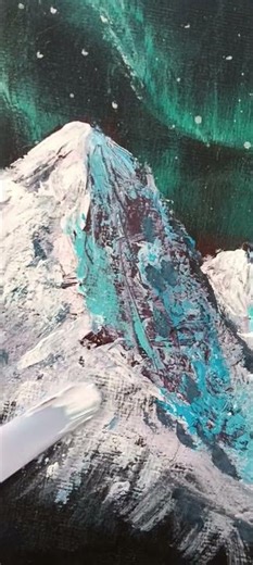 Working on some northern lights with acrylic painting.... #northernlights #snowmountain #artprocess