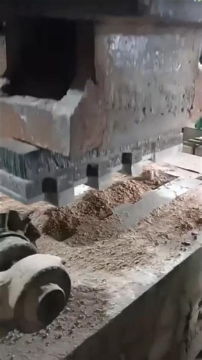 DIY block making a compact machine vibrating to form concrete hollow bricks on the ground