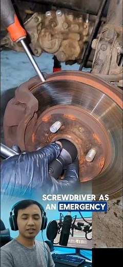 STOP Wheel Spin! The Screwdriver Hack to Remove Any Axle Nut #mechanictips #toolhacks #carrepair