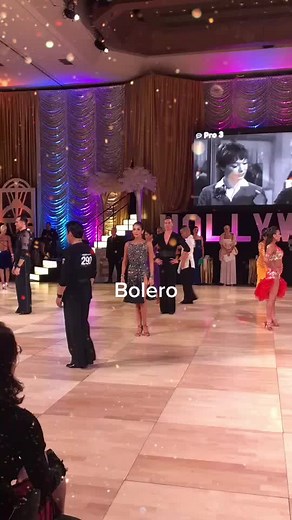 Professional Bolero Dance: Competitive Ballroom Rhythm