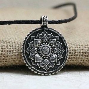 2.1M views · 1K reactions |  Purity, Beauty and Rebirth. A perfect emblem that gives a deep significance. As it shows there is more to beauty than what meets the eye. Get this Antique Silver Om Lotus Mandala Pendant Necklace for UP TO 50% OFF, in celebration of International Youth day!  Grab yours now  https://store.projectyourself.com/OmLotusMandala Each sale helps provide books to children in need!  Thank you! | Project Yourself | Facebook