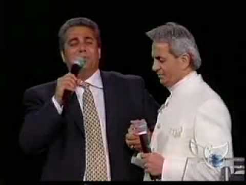 Henry Hinn singing - I hear angels singing praises ...