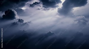 As the darkness fades shapes and shadows emerge in the clouds creating an otherworldly landscape unlike anything seen on Earth.