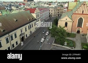 old train rides along railway among tropical landscape transporting tourists slow motion. Concept transportation emigrants travel