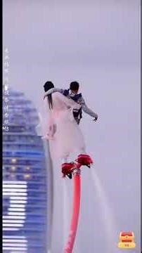 Lift carry by Chinese woman on water flyboard