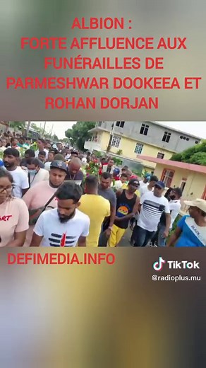 Somber Funeral Procession for Parmeshwar Dookea