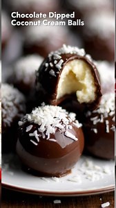 🥥 Chocolate Dipped Coconut Cream Balls | Soft, Sweet & Straight From the Candy Dish 🍰 These little coconut treats take me right back to the days when homemade candies were tucked into tins and brought out for company. That first bite, creamy inside with a chocolate snap, always feels like a small celebration. #recipe #strawberry #cookies #relsviralシ #newyear #fblifestyle | Sweet Magic Recipes