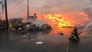 Massive wind-driven fire engulfs Chicago paper recycling plant