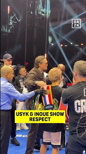Naoya Inoue embraces with Oleksandr Usyk after his win over Alan Picasso
