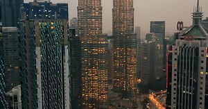 2019-03-08 MALAYSIA. Drone Aerial view 4k Footage of Kuala Lumpur city skyline on sunset in Malaysia