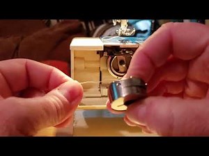 How to install the bobbin on a Riccar RE 571 electronic super-stretch sewing machine