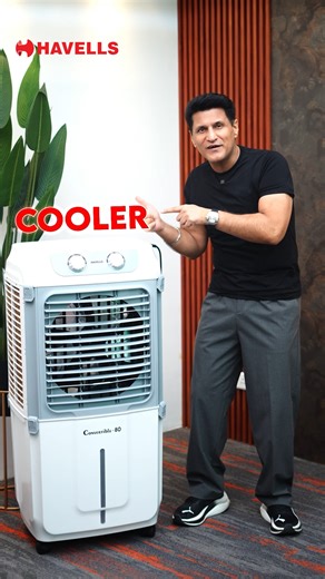 The Havells Convertible 80L Desert Cooler is built for modern spaces! It doesn't just work as a cooler but also doubles up as a side table, thanks to its convertible feature. With a powerful motor, wide air throw, and a honeycomb pad bacteria shield, it's everything you need this summer. Tech expert Rajiv Makhni approves. Still need any convincing? #Havells #HavellsAirCooler #ConvertibleCooler #CoolsYourPlaceSavesYourSpace | Havells