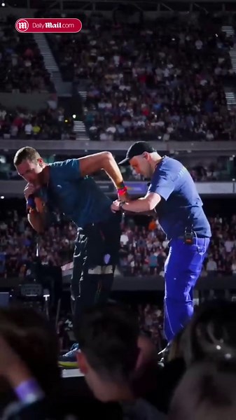 Coldplay frontman Chris Martin falls through trapdoor on stage