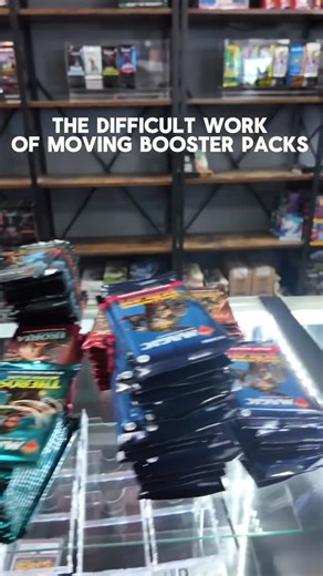 Collector Legion on Instagram: "Moving booster packs is tough work, so enjoy the making of the booster wall! #mtg #magic #cardstore"