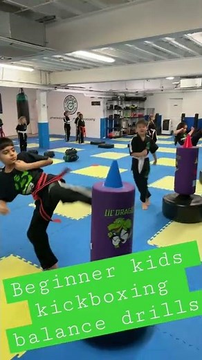 Beginner kids kickboxing balance drill.