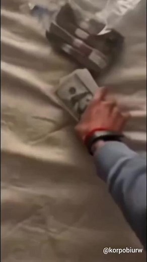 Close-Up Currency Handling Techniques with US Dollars