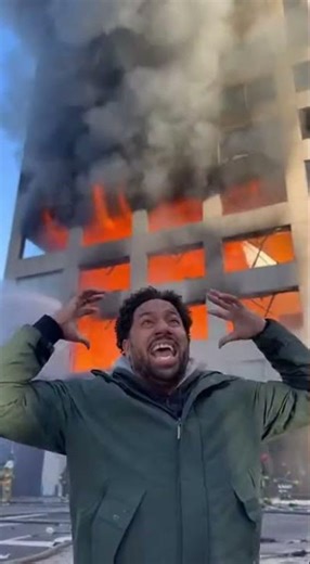 Blaze in the Skyline A Screaming Figure Emerges From a Sea of Panic