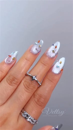 Vettsy on Instagram: "💡🎄Super Sparkling Crystal Christmas Light Nails 💅✨ What do you think? 😉 🛒Using Vettsy: IG Nail Trend Set-Crystal Light ✨Super Cat Eye Gel ✨Chrome Painting Gel-Silver ✨Holiday Rhinestones @vettsybeauty Press-On Nail Set-Crystal Light 👉 Shop the same nail supplies via my bio or visit vettsy.com Follow @vettsystore & @vettsynails for more nail inspiration 🧚‍♀️ 👭Tag friends who would like this👭 #vettsycateye #vettsynails #cateyenails #crystalnails #rhinestonenails #sil