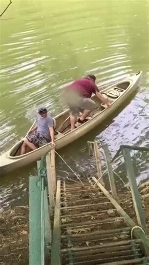 Two Men Fail and Capsize Canoe on River