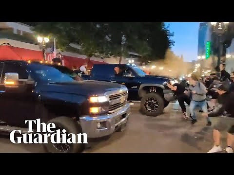 Trump supporters drive through crowd and pepper spray protesters in Portland