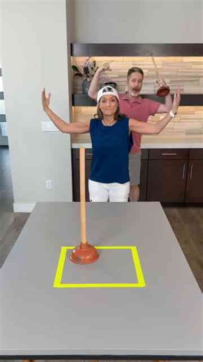 Plunger toss challenge game