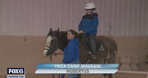 YMCA Camp Minikani is a place where campers canoe and swim