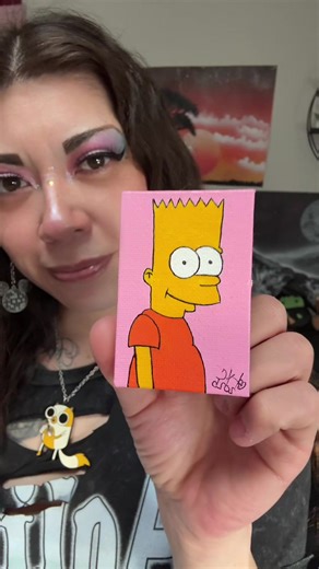 Day 17! I started this series in hopes to grow my following, my audience and my clientele. (Customs available by the way.) I’m a 90s baby and The Simpsons has been a staple in pop culture for decades. Who doesn’t like Bart Simpson? This mini is available for purchase. The canvas is small, 3” x 2”. I never trace or use a projector, just good ol’ human hands. Painted with acrylic and sealed for glossy finish. Follow along to see what else I paint! #nostalgiacore #artreveal #bartsimpson #thesimpson