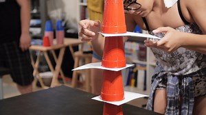 YANK ME Items: Cups, Note cards (size 5 x 8) Rules: Players must create a tower of 4 cups with note cards placed between each cup. Once built, players must remove each note card one-by-one, so that all 4 cups rest in a single stack. | Outscord