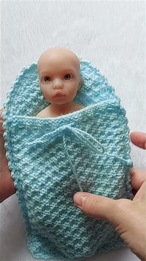 Soft Knitted Cocoon for 9 Inch Dolls. Easy Pattern #dolls #ravelry #patterns #dollclothing #shorts