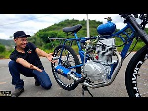 Bicycle with a motorcycle engine.