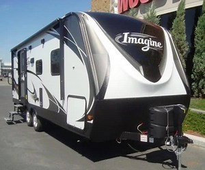 This 2018 Grand Design RV​ Imagine - Towing Lite 2150RB is the perfect unit for a smaller family or a couples coach. This travel trailer offers a rear bath layout, a single slide, plus many comforts of home! See it here: https://goo.gl/m8b3gX | Woody's RV World Alberta