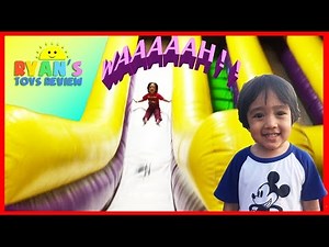 Ryan plays on HUGE Indoor playground GIANT INFLATABLE SLIDES