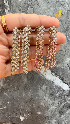 Akanksha Jain on Instagram: "Bold and timeless — three striking pairs of Diamond Earrings adorned with Rubies, Blue Sapphires, and Emeralds are crafted to make a statement at every party and celebration. The vibrant gemstones contrast beautifully with the brilliance of diamonds, creating a look that feels both fresh and undeniably luxurious. ✨ Akanksha Jewels 💎 Connect with us via Whats app link for price and details https://wa.me/918572088285 . Discover our new designs at www.akankshajewels.co