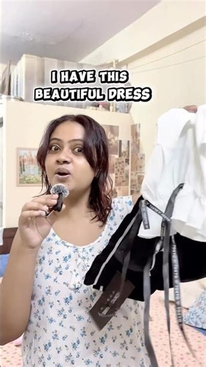 I have this beautiful dress in my hand “Do comment for the link”