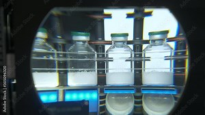 Workplace of a scientific engineer in a laboratory. Large Magnifying Lens. Jars with white medical powder